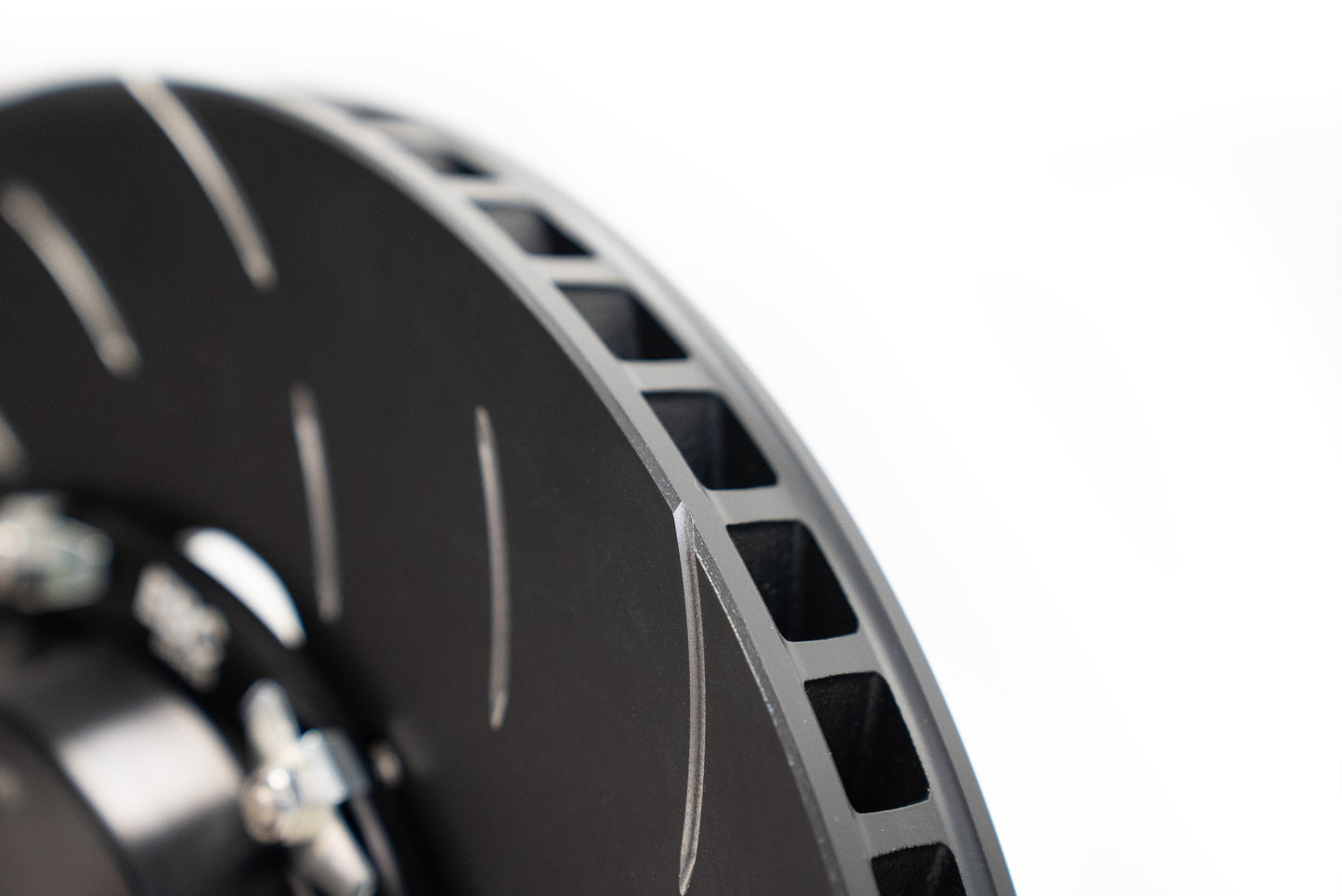 A sleek and modern alloy wheel with an intricate multi-spoke design in gunmetal gray, featuring a green "Leighton" logo at the center.