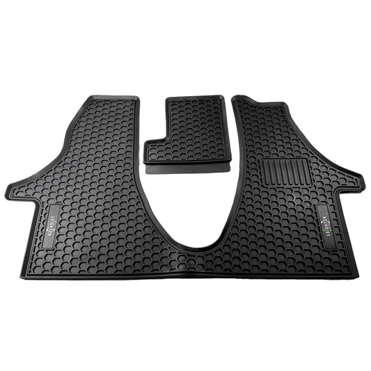 Black rubber car floor mats with a textured honeycomb pattern, designed for protection and easy cleaning.